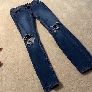 Free people skinny jeans with holes in Knees